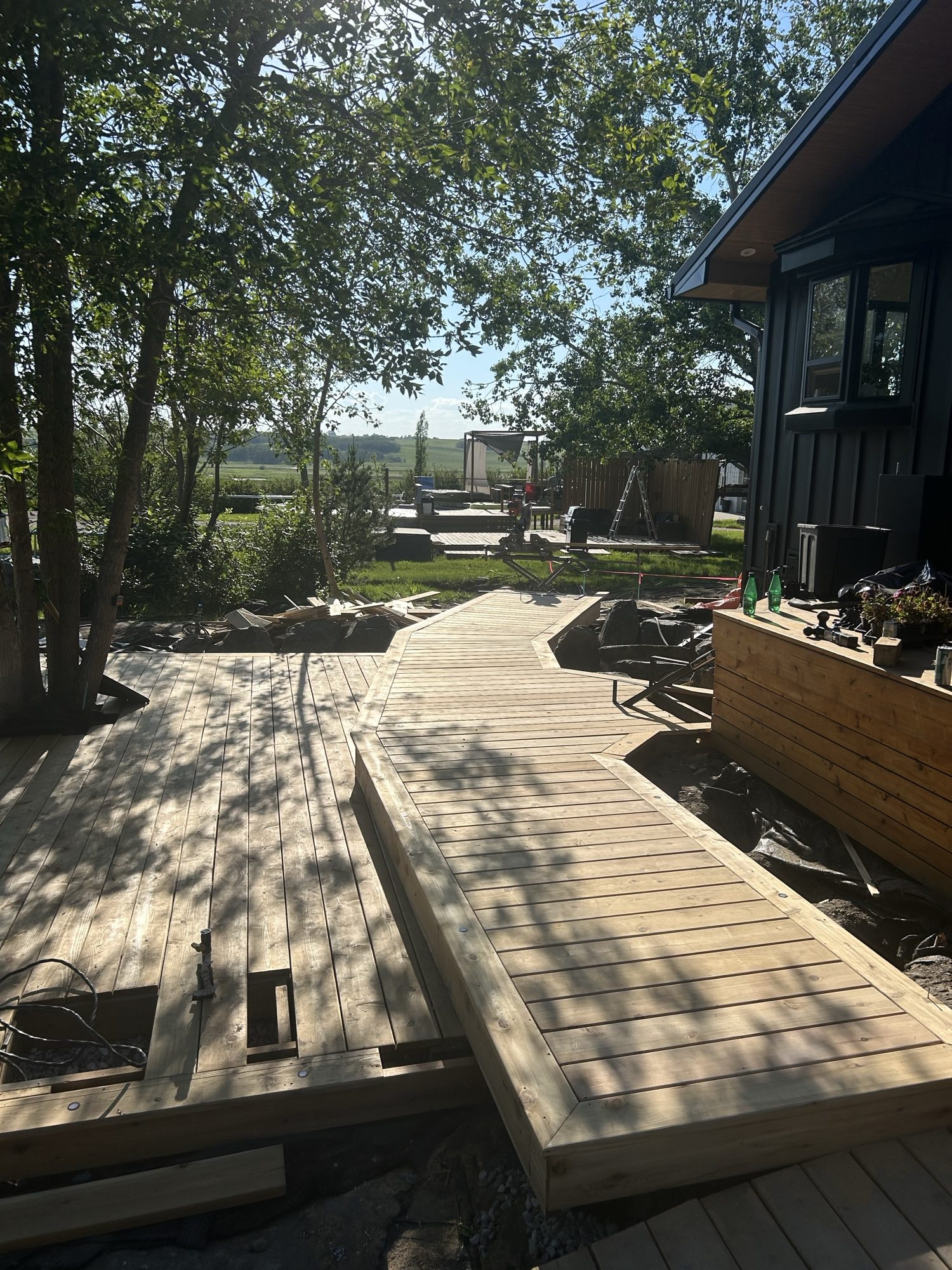 Finished winding wooden boardwalk leading to the house